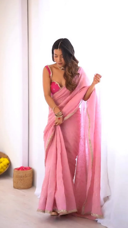 Designer pink organza floral embroidered saree with golden lace border and silk blouse
