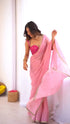 Party wear pink organza saree with golden border and rani pink silk blouse material